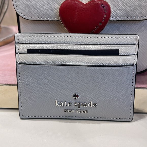 Kate Spade Madison Small Slim Card Holder
Platinum Grey Multi
NWT - Picture 14 of 16